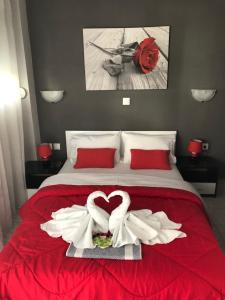 Postel nebo postele na pokoji v ubytování Niriides Rooms