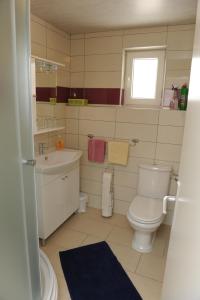 Koupelna v ubytování Apartmani Ivišić