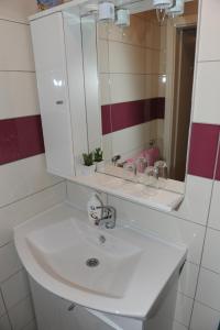 Koupelna v ubytování Apartmani Ivišić + 37 fotografií