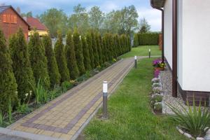 Vonkajšia záhrada v ubytovaní Bałtyk Park Gąski