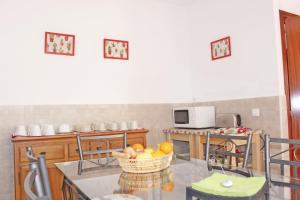 A television and/or entertainment centre at Casa Valdelagrana Playa