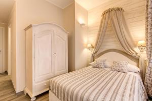 Postel nebo postele na pokoji v ubytování Casa Mia Vaticano Guest House