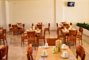 Εστιατόριο ή άλλο μέρος για φαγητό στο Hotel RRU Puebla