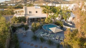 an overhead view of a resort with a swimming pool at Archetypo Villas and Suites in Naxos Chora