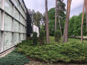 an external view of a building with trees at 365 in Jūrmala