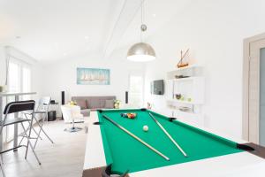 a living room with a pool table at Villa Sena in Ražanj