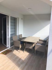 Posezení v ubytování Apartmani BAU BAB + 21 fotografií