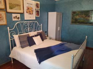 Postel nebo postele na pokoji v ubytování B&B La Dimora di Charme