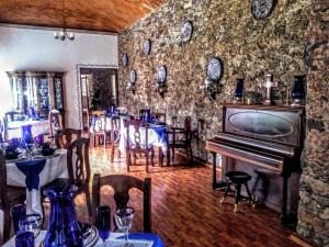 TV a/nebo společenská místnost v ubytování Hotel Spa Hacienda Real la Nogalera