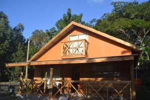 a small house with a window on top of it at Cabaña Manuto Tahai in Hanga Roa