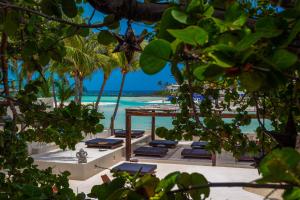 a view of the beach from the resort at Lotus Beach Hotel - Adults Only in Isla Mujeres