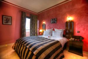 Postel nebo postele na pokoji v ubytování Amani Hotel Suites & Spa
