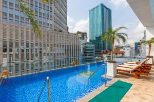 a large swimming pool on top of a building at Huong Sen Annex Hotel in Ho Chi Minh City