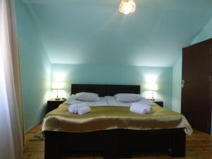 Ένα ή περισσότερα κρεβάτια σε δωμάτιο στο Anano Guest House