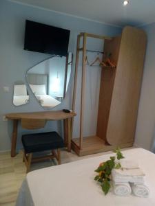 Postel nebo postele na pokoji v ubytování Aegialis Apartments (Dimitros)