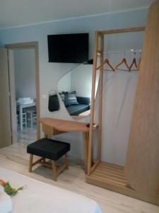 Postel nebo postele na pokoji v ubytování Aegialis Apartments (Dimitros)