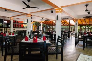 Restaurant o un lloc per menjar a Amal Beach Hotel