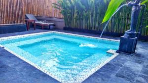 Bazén v ubytování Hotel Neo - Kuta, Jelantik nebo v jeho okolí
