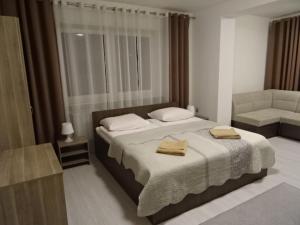 Postel nebo postele na pokoji v ubytování Villa Eleven