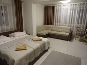 Postel nebo postele na pokoji v ubytování Villa Eleven
