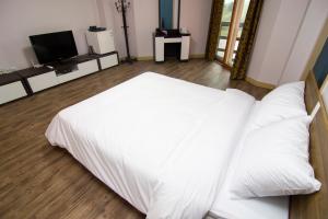 Postelja oz. postelje v sobi nastanitve Hyundai Elliot Hotel and Resort