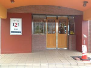 Eine Fassade oder ein Eingang zu Hotel 1-2-3 Shimada