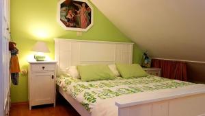 Postel nebo postele na pokoji v ubytování Apartment Silvia
