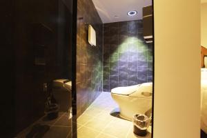 Um banheiro em Benikea Rich Diamond Hotel