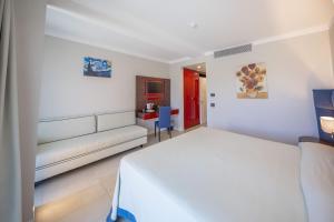 Victoria Palace Cefalù客房内的一张或多张床位