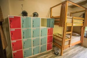 Postel nebo postele na pokoji v ubytování WW Backpackers