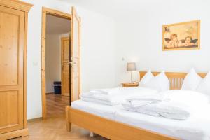 Posteľ alebo postele v izbe v ubytovaní Ferienalm Schitter