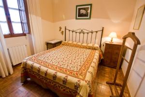 Łóżko lub łóżka w pokoju w obiekcie Vivienda Casa Luisa