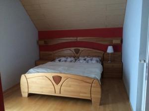 Posteľ alebo postele v izbe v ubytovaní Gemütliches Ferienhaus am Waldrand