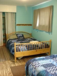 Säng eller sängar i ett rum på Wild North Bed & Rest