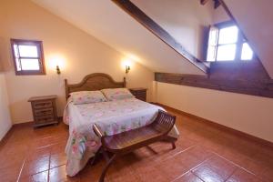 Łóżko lub łóżka w pokoju w obiekcie Vivienda Casa Luisa