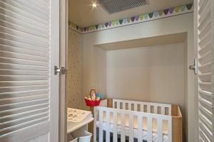 A bed or beds in a room at Airotel Stratos Vassilikos Hotel