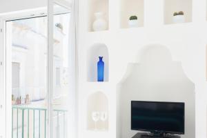 TV a/nebo společenská místnost v ubytování Boutique Suites in Piazzetta