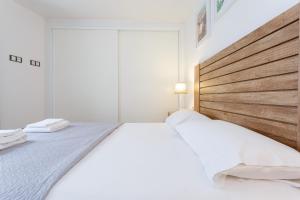 Postel nebo postele na pokoji v ubytování La Sorpresa del GENOVES by Cadiz4Rentals