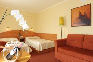 Posteľ alebo postele v izbe v ubytovaní Hotel Gorzów