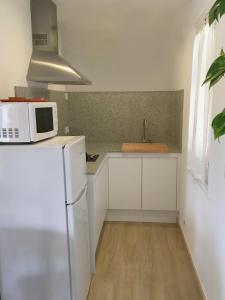 Apartamentos Surest的厨房或小厨房