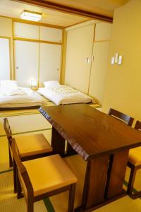 
Tempat tidur susun dalam kamar di Ryokan Kamogawa Asakusa
