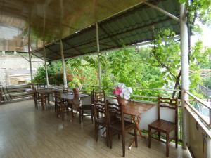 a group of tables and chairs on a patio at Nato & Lado in Sighnaghi