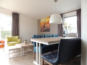 Posezení v ubytování 6 pers. Veluwelodge XL met Sauna