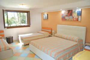 Letto o letti in una camera di Borgo Console