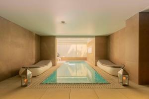 Bazén v ubytování UNA HOTELS One Siracusa nebo v jeho okolí