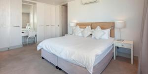 Postel nebo postele na pokoji v ubytování Harbour House Hotel - Le Paradis Apartments