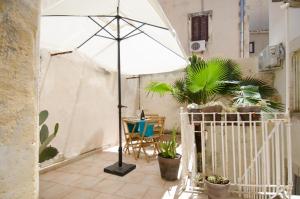 Patio alebo iná vonkajšia časť ubytovania La terrazza di Archimede- Ortigia Holidays