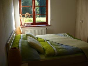 Postel nebo postele na pokoji v ubytování Apartmán Zlatá Vyhlídka
