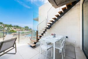 Balkón alebo terasa v ubytovaní Mirador Blue J - Cala Sant Vicenç