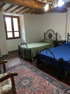 A bed or beds in a room at San Martino Vald'Afra